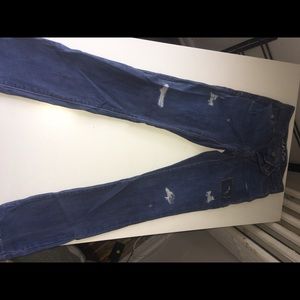 Medium wash jeans with faux rips